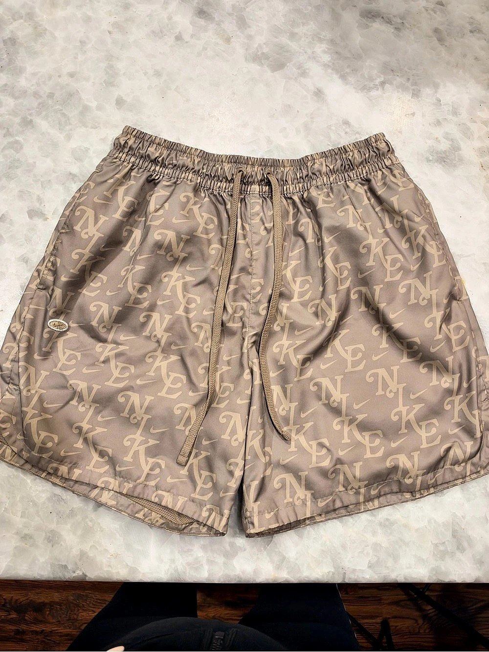 Nike Woven Monogram Flow Shorts in Brown & Cream